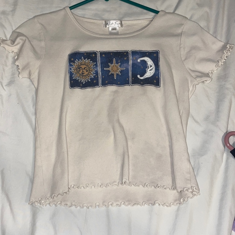 Selling this white fawn baby tee size large